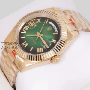 "40mm Yellow Gold Watch with Green Dial, Roman Numerals & Fluted Bezel "
