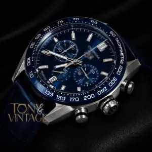 Chronograph Silver Case Watch with Deep Blue Dial, Bezel, and Leather Strap