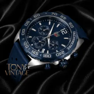 Chronograph Silver Watch with Blue Dial, Bezel, and Rubber Strap
