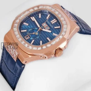 Moon Phase Rose Gold Watch with Stone Bezel, Blue Dial, and Leather Strap