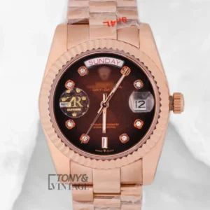 Rose Gold Watch with Chocolate Brown Dial, Stone Numerals, and Fluted Bezel