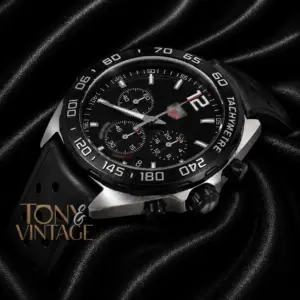 Silver Case with Black Dial, Bezel, and Black Rubber Strap Watch