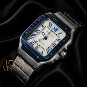 Silver Watch With Blue Bezel and White Dial Chain Strap