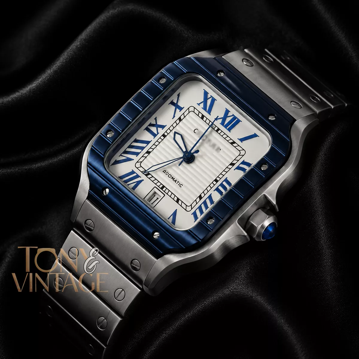 Silver Watch With Blue Bezel and White Dial Chain Strap