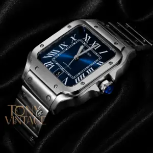 Silver Watch With Blue Dial and Roman Numerals