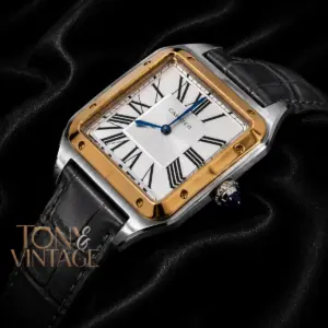 Silver Watch with Gold Bezel, Dial, and Leather Strap