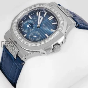 Silver Watch with Stone Bezel, Blue Dial, and Leather Strap