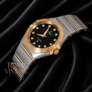 Two Tone Yellow Gold With Black Dial & Stone Figure Ladies Watch