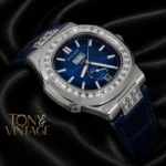 Annual Calendar Moon Phase Silver Watch with Stone Case, Blue Dial, and Leather Strap