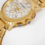 CHRONOGRAPH YELLOW GOLD WITH WHITE DIAL STONE FIGURE LADIES WATCH