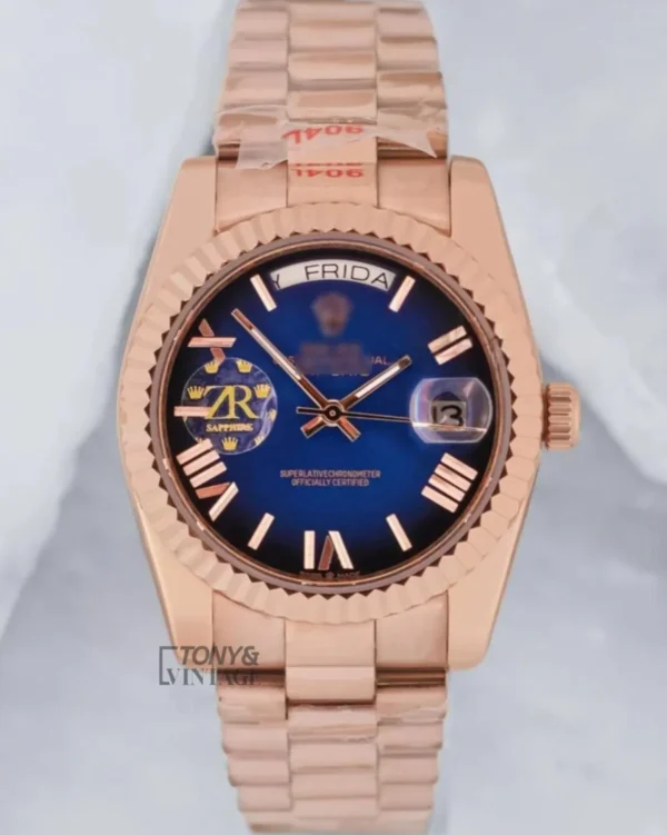 Rose-Gold-Blue-Dial-Fluted-Bezel1.webp