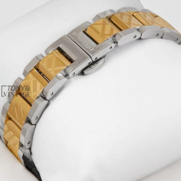 TWO TONE YELLOW GOLD WITH GREEN DIAL & STONE FIGURE LADIES WATCH