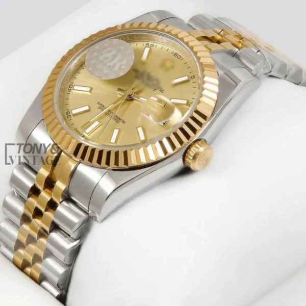 Two-Tone-Yellow-Gold-Automatic-Watch-with-Fluted-Bezel-and-Matching-Dial1.webp