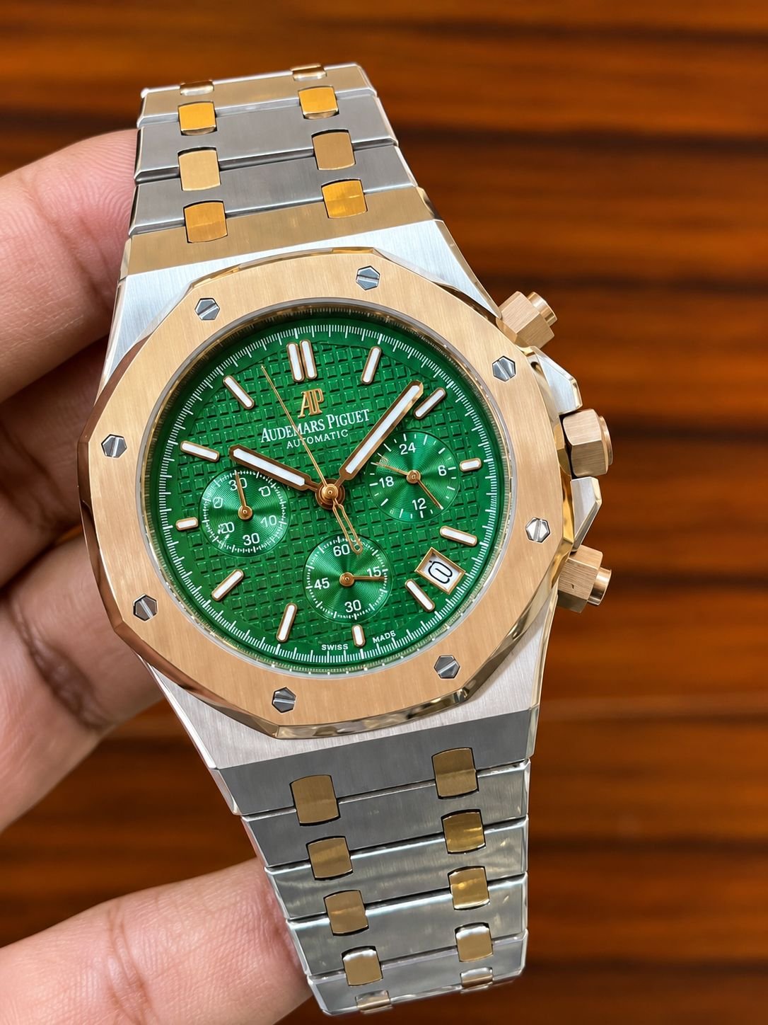 Steel sports watch on a customer's wrist