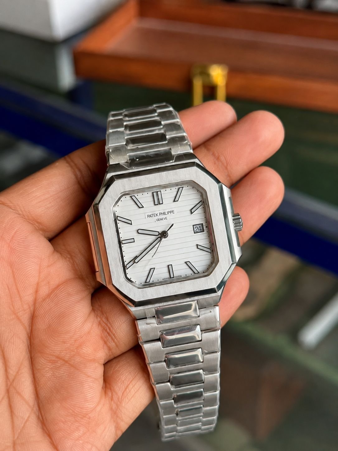 Skeleton watch held in a customer's hand